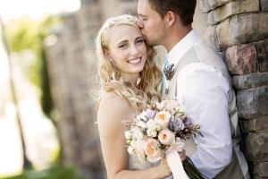bride and groom kissing Wedding Day Photos