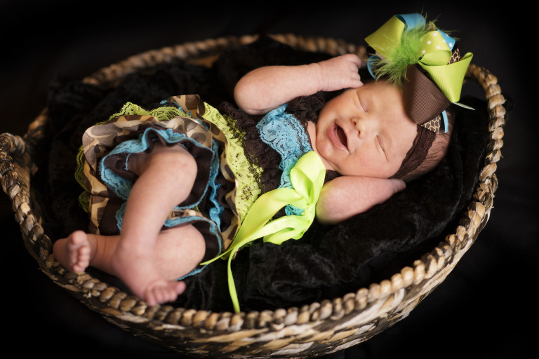 Newborn Pictures sleeping laughing baby