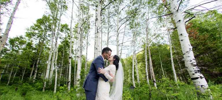 Bride and Groom in Tall Trees
