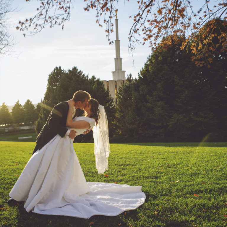 Bride and Groom Kissing at Sunset at Provo Temple