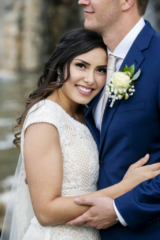 Bride smiling holding Groom