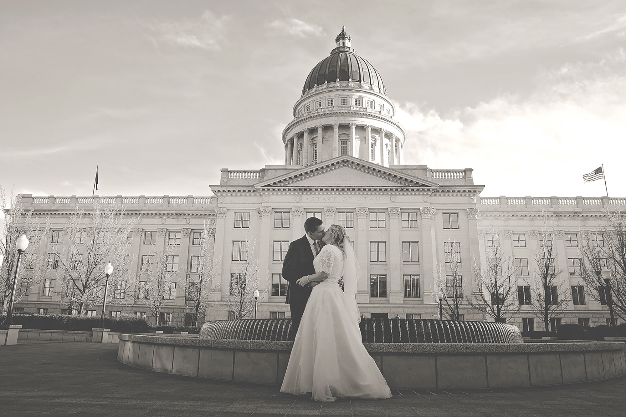 Bride and Groom kissing at Salt Lake Capitol Building
